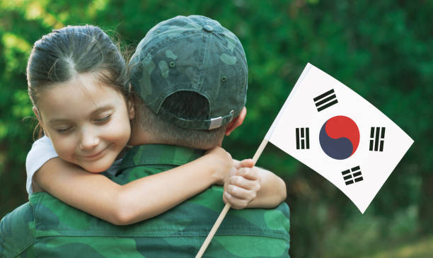 istock South Korean Soldier And His Daughter 1313903040