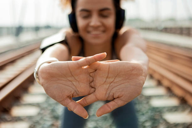 istock Young mixed race girl stretching hands 1313905559