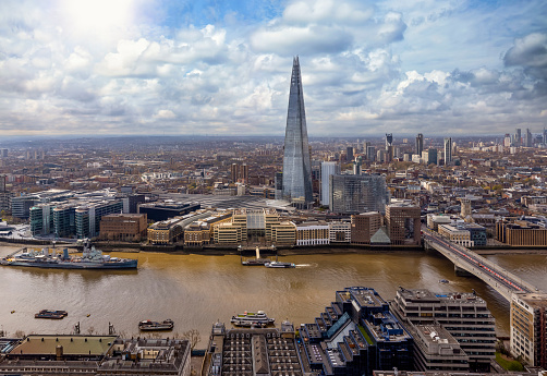 Elevated, panoramic view to the modern skyline of London, United Kingdon, during a sunny day