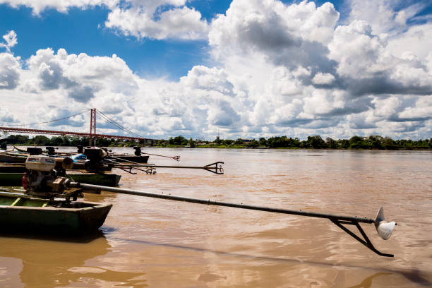 istock Image in Peruvian jungle of a boat in a river in Amazon forest. Traditional way of transportation in tropical rivers in Peru. 1313908844