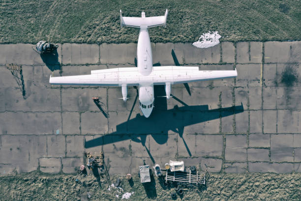 istock Propeller plane parking at the airport 1313913892