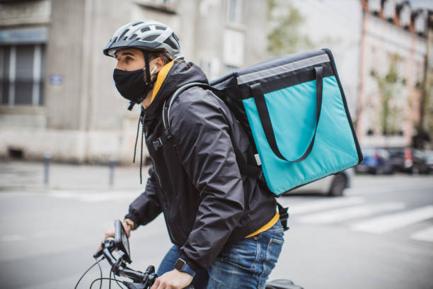 istock City delivery on bicycle 1313914001