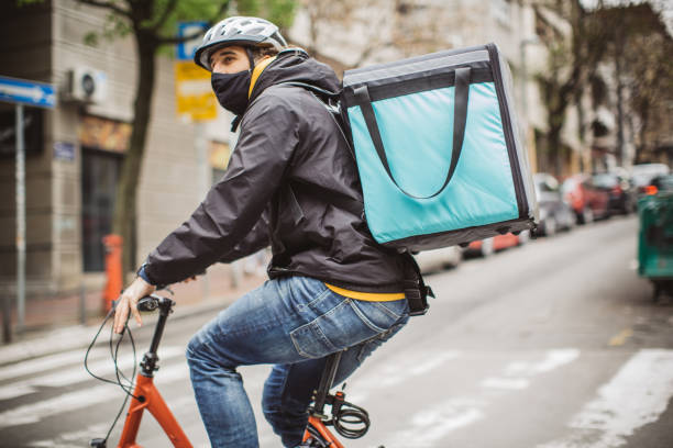 istock City delivery on bicycle 1313914053
