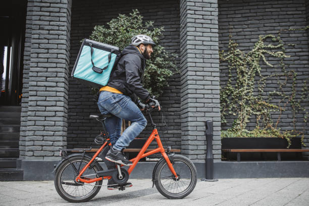 istock City delivery on bicycle 1313914188