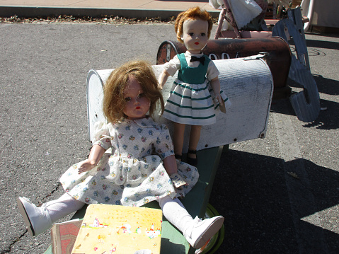 Vintage doll collection on car booth sale