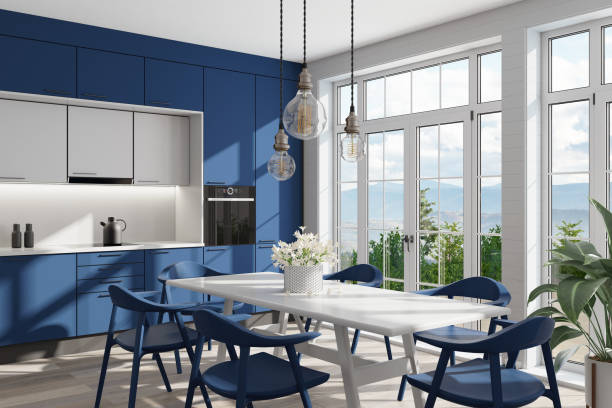 istock Naval blue and white Modern Scandinavian kitchen with large dining table and chairs. Large windows. Open space kitchen concept. Summer scene. 1313916915