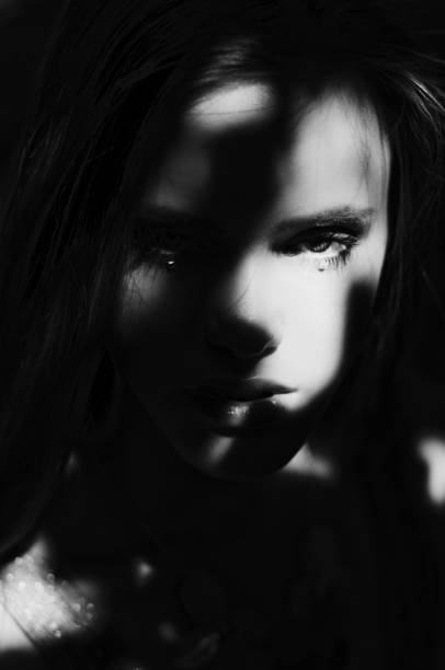 istock Young beautiful girl with glitter on the face 1313918681