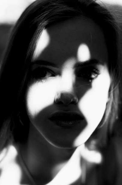istock Young beautiful girl with glitter on the face 1313919502