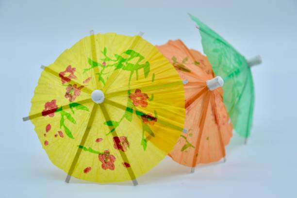 istock Group of colorful cocktail umbrellas in studio shot 1313921006