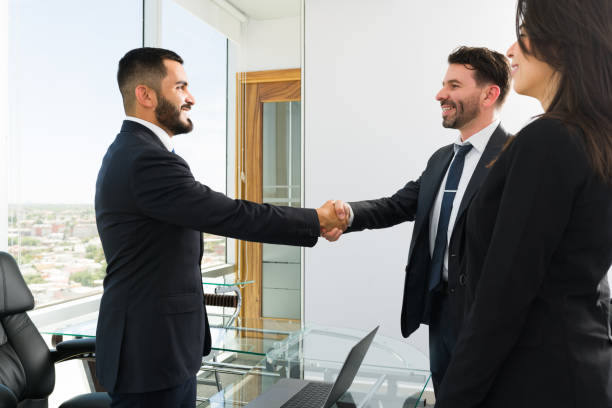 istock Businessmen greeting before an appointment 1313921643