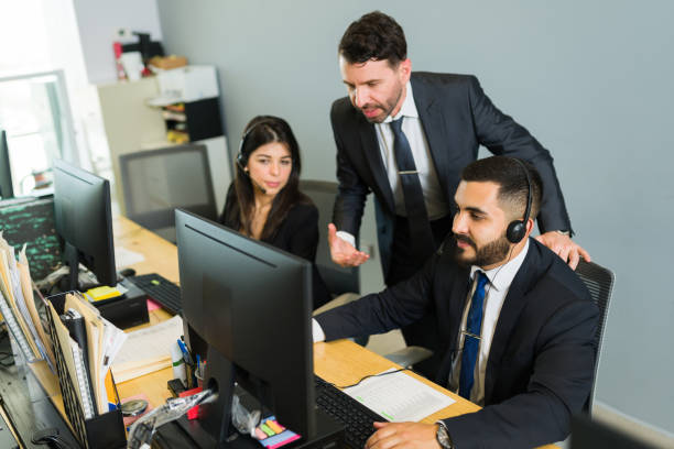 istock Boss supervising the work of the sales representatives 1313921814