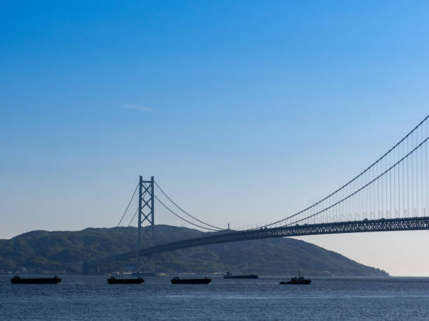 istock Blue Sky and Akashi Kaikyo Bridge 1313929959