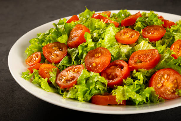 istock Fresh salad with lettuce and tomato. 1313933042
