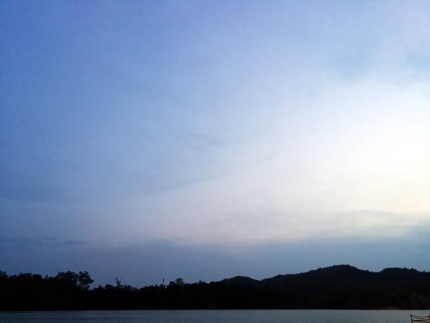 istock wide blue sky over mountain in the evening. 1313934826