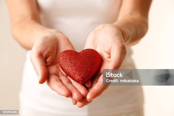 Giving Love Stock Photo - Download Image Now - Adult, Adults Only, Charitable Donation