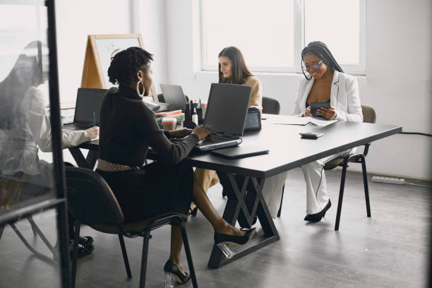 istock Business multi racial women working in the office 1313946982