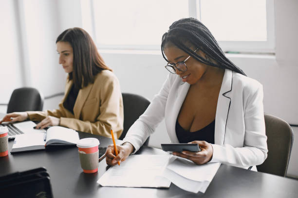 istock Business multi racial women working in the office 1313946995