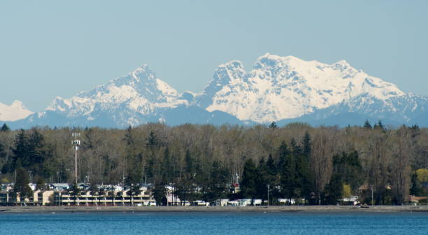 Looking at Mount Baker over from Semiahmoo Bay and Jorgensen Pier, Blaine, Whatcom, Washington Looking at Mount Baker over from Semiahmoo Bay and Jorgensen Pier, Blaine, Whatcom, Washington blaine washington stock pictures, royalty-free photos & images