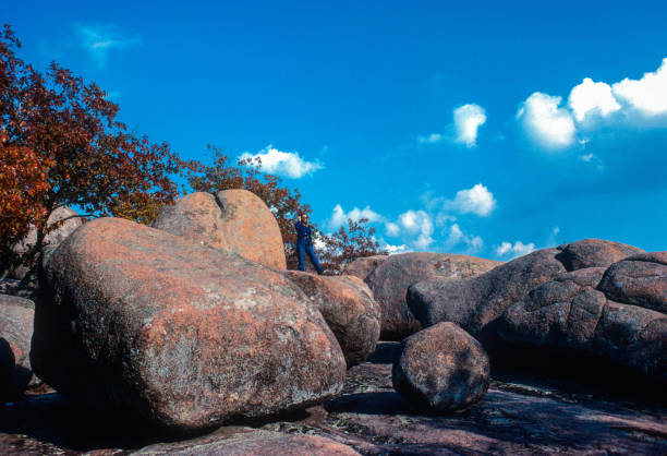 istock Elephant Rocks State Park - Hiker on Assembly of Rocks - 1977 1313949759