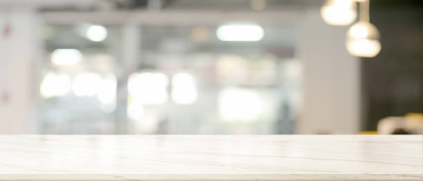 istock Empty marble desk in blurred background, copy space on the table 1313949994