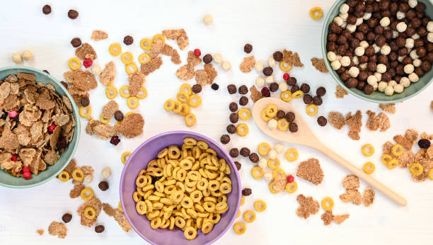 istock Healthy children breakfast. Corn flakes with cereal in a bowls on a white background 1313953011
