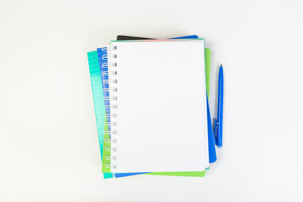 istock top view of open notebook with pen on gray background, school notebooks with coil spring, office notebook flat lay 1313958952