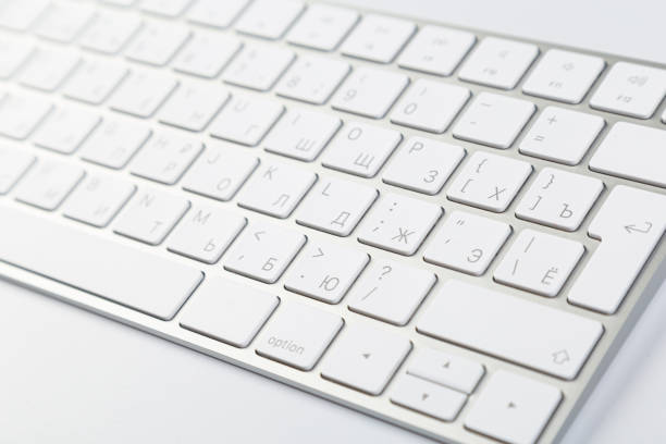 istock Aluminum computer keyboard wireless connection. Beautiful modern design, isolated on white background. close up view 1313959156