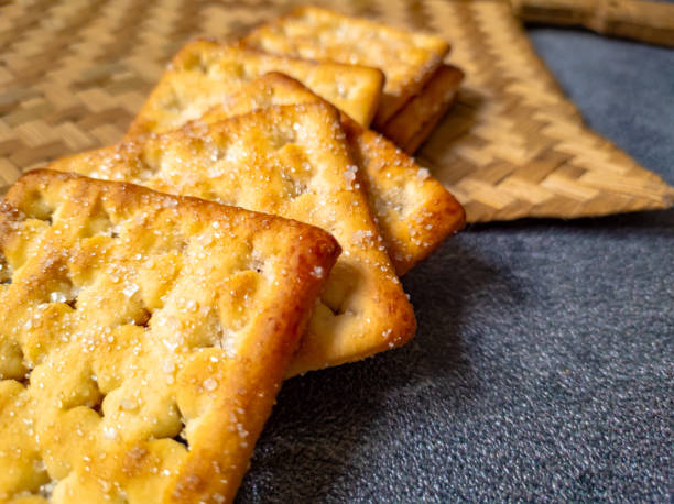 istock Close Up Sweet Crunchy Crackers isolated on abstract background. 1313959629