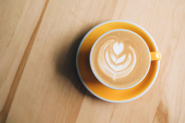 istock Fresh flavored coffee art is on the wooden table. 1313961812