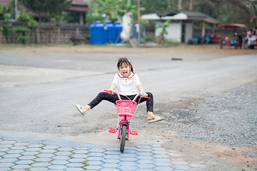 girl riding a bicycle Exercise during the holidays.