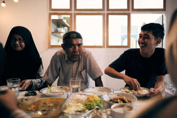 istock Lovely Muslim Break Fasting Together 1313964673