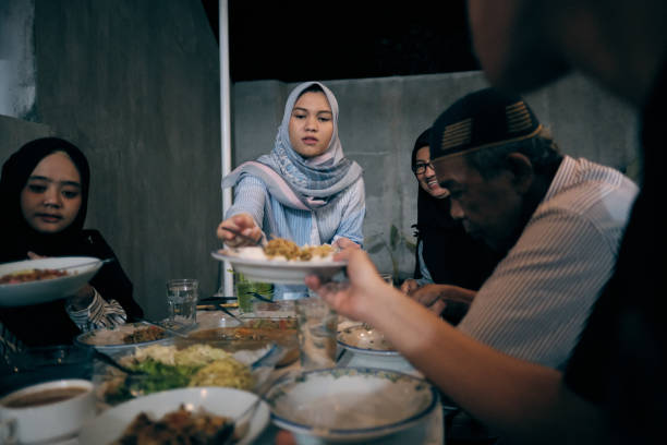istock Lovely Muslim Break Fasting Together 1313964795