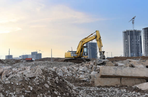 istock Excavator with jaw crusher bucket for crushes concrete and recycle material. 1313966029
