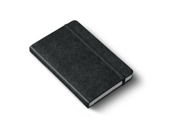 black closed notebook isolated on white black closed notebook mockup isolated on white moleskin stock pictures, royalty-free photos & images