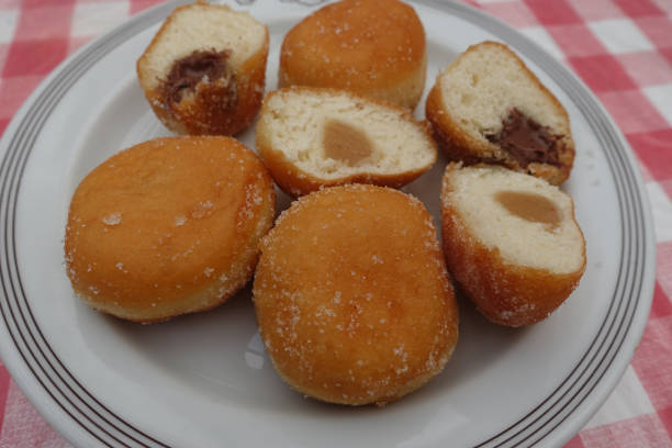 istock Sweet donuts with jam or chocolate 1313967343