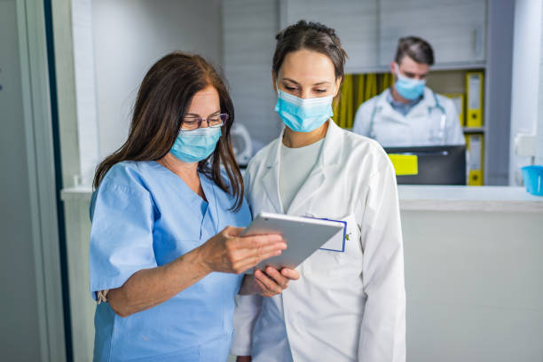 istock Healthcare workers having discussion 1313968078