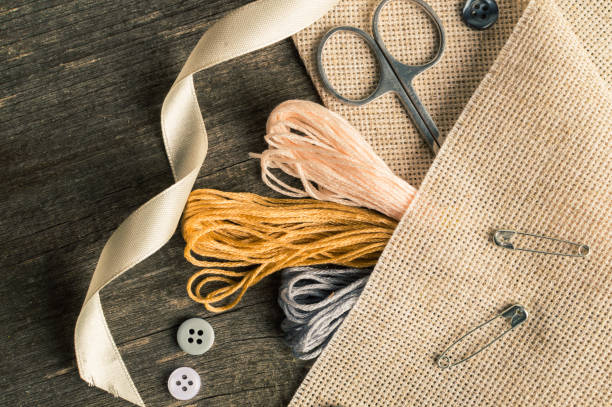 istock Accessories for hobbies: tape, scissors, needle and pin. Flat lay composition 1313970980