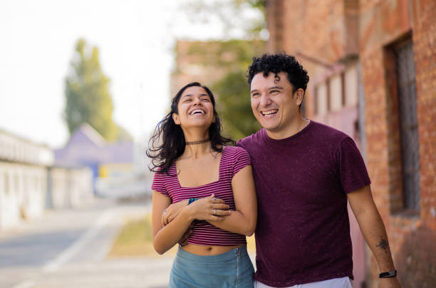 istock Young happy couple spending time on the street. 1313971996