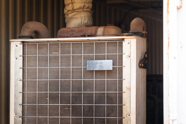 An electric power generator which is generate electricity supply at industrial working site. Close-up and selective focus at metal mesh part of its cooling system.