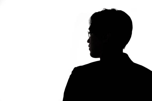 istock Silhouette of thinking businessman with white background. 1313972145