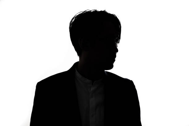istock Silhouette of thinking businessman with white background. 1313972148