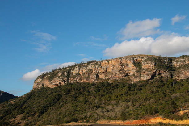 istock Steep Rocky Slopes Leading Down into Gorge 1313973714