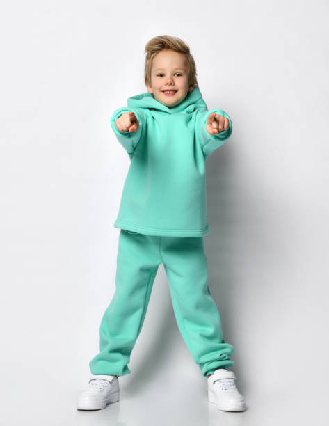 istock joyful active boy pointing his fingers at you 1313974472