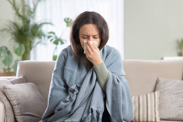 istock Young woman suffering from cold 1313975078