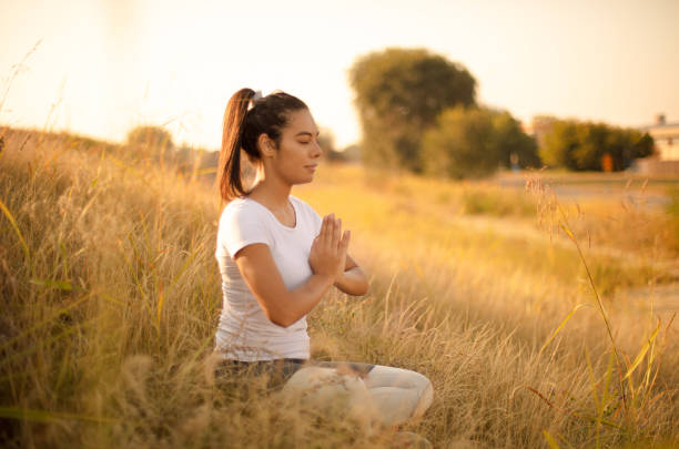 istock Yoga poses at the park. 1313980456
