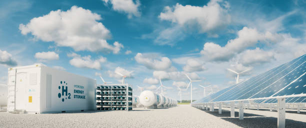 Modern hydrogen energy storage system accompaind by large solar power plant and wind turbine park in sunny summer afteroon light with blue sky and scattered clouds. 3d rendering. Modern hydrogen energy storage system accompaind by large solar power plant and wind turbine park in sunny summer afteroon light with blue sky and scattered clouds. 3d rendering. hydrogen stock pictures, royalty-free photos & images