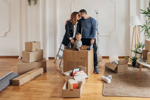istock Couple with son in their new home 1313982218