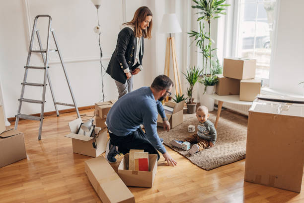 istock Couple with son in their new home 1313983822