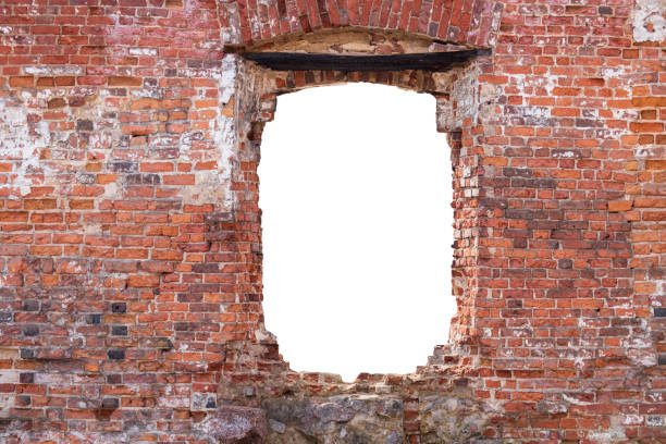 Abandoned tower seen the a window of an old derelict tower in waste land near the coast in Gruissan, in southern France. October 2022