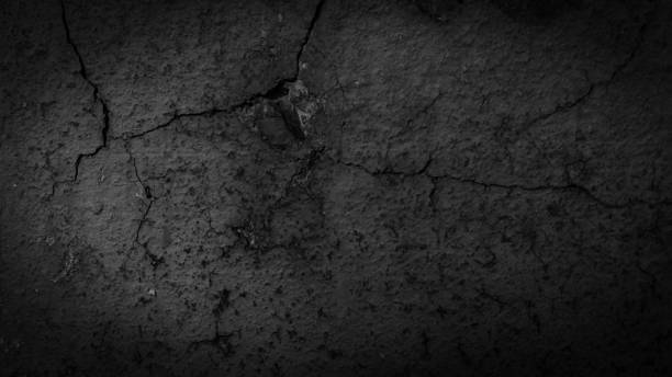 istock macro photo of black brick with visible texture. background 1313989503